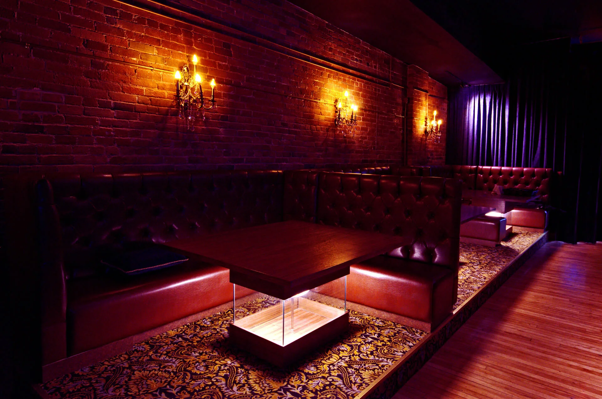 Exclusive VIP lounge area with plush seating and personalized service